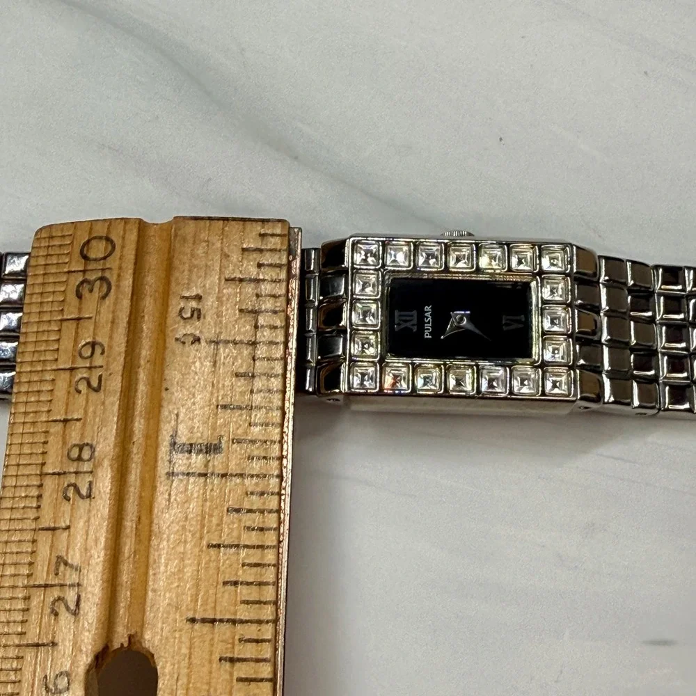 Pulsar Womens Silver Tone Crystal Bezel Black Dial Dress Watch V810-X064